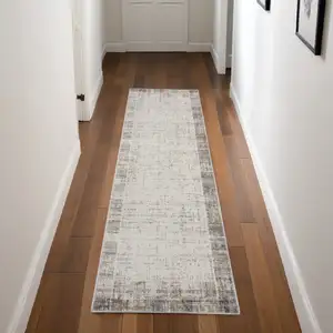 Photo of 8' Ivory and Gray Abstract Runner Rug