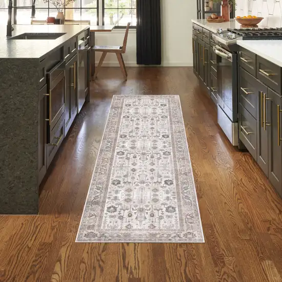 8' Ivory and Gray Tribal Distressed Non Skid Runner Rug Photo 5