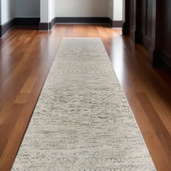 12' Ivory and Gray Wool Hand Knotted Runner Rug With Fringe Photo 1