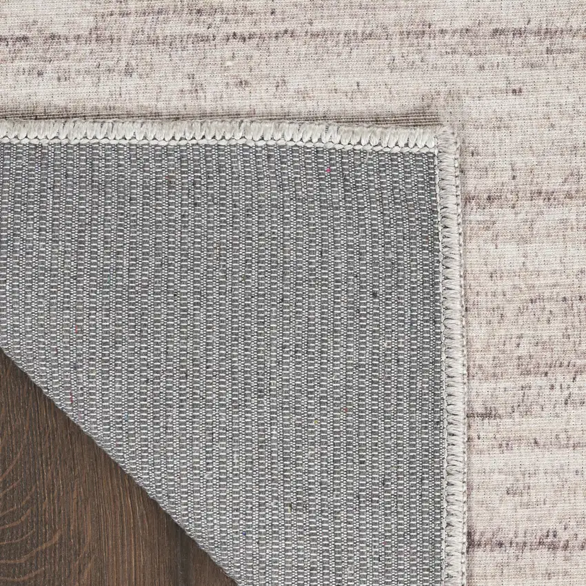 10' Ivory and Light Brown Abstract Washable Runner Rug Photo 9