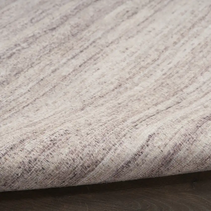 10' Ivory and Light Brown Abstract Washable Runner Rug Photo 9