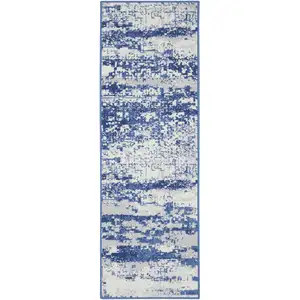 Photo of 8' Ivory and Navy Blue Abstract Distressed Non Skid Runner Rug