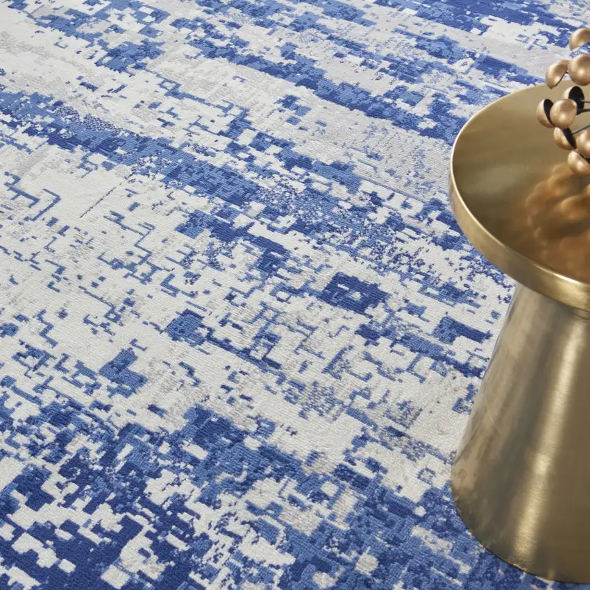 8' Ivory and Navy Blue Abstract Round Rug Photo 8