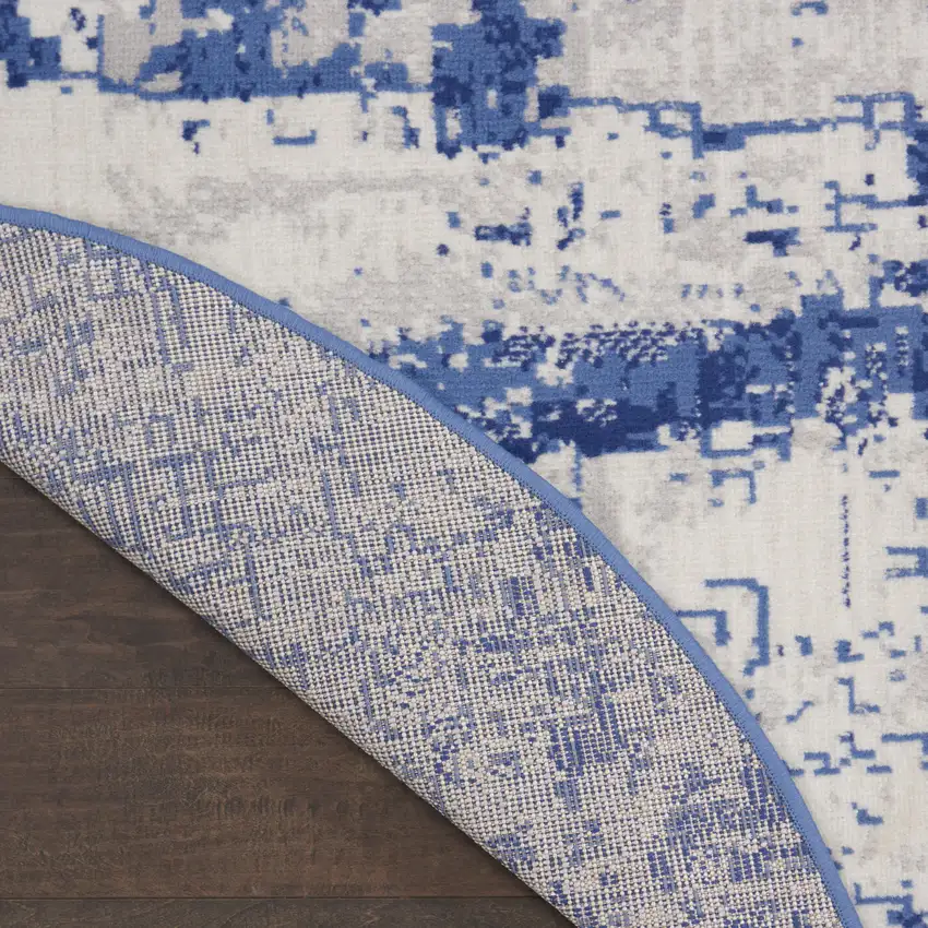 8' Ivory and Navy Blue Abstract Round Rug Photo 9