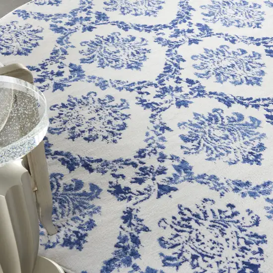 8' Ivory and Navy Blue Damask Distressed Round Rug Photo 9