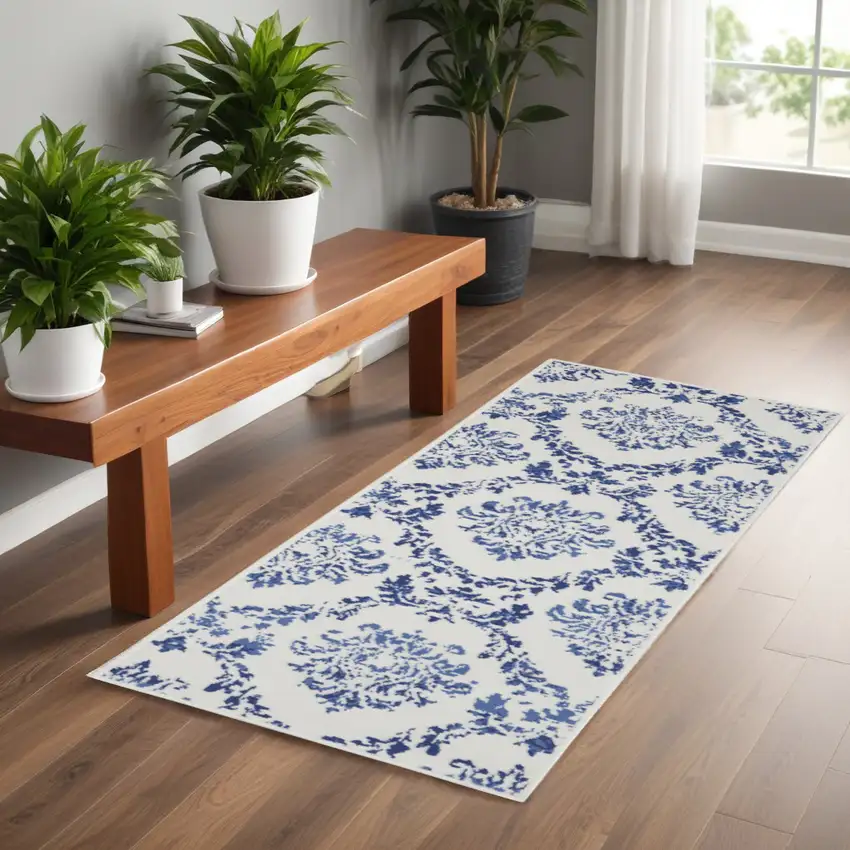 6' Ivory and Navy Blue Damask Distressed Runner Rug Photo 1