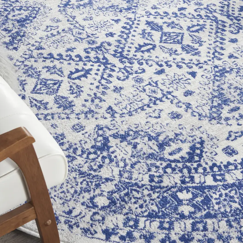 8' Ivory and Navy Blue Geometric Distressed Round Rug Photo 6