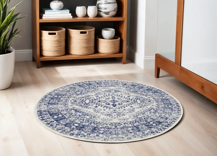 5' Ivory and Navy Blue Geometric Distressed Round Rug Photo 1