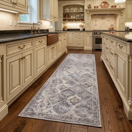 8' Ivory and Tan Floral Power Loom Distressed Washable Runner Rug Photo 1