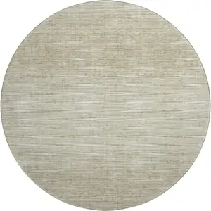 Photo of 8' Khaki And Beige Abstract Washable Round Rug With UV Protection