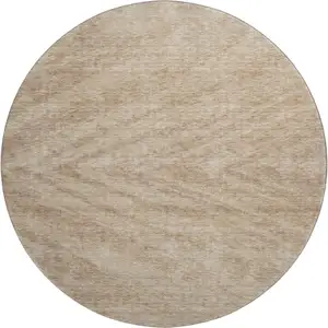 Photo of 8' Khaki And Beige Abstract Washable Round Rug With UV Protection