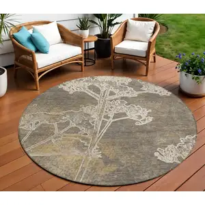 Photo of 8' Khaki And Beige Round Floral Washable Indoor Outdoor Area Rug