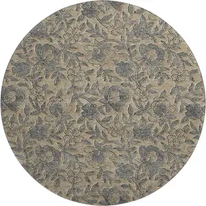 Photo of 8' Khaki And Gray Floral Washable Round Rug With UV Protection