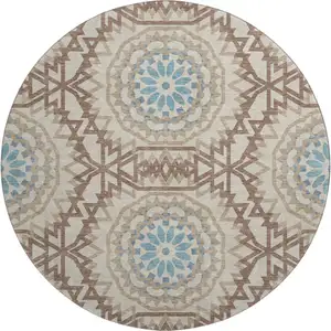 Photo of 8' Khaki And Teal Geometric Washable Round Rug With UV Protection