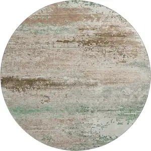 Photo of 8' Khaki Beige And Ivory Abstract Washable Round Rug With UV Protection