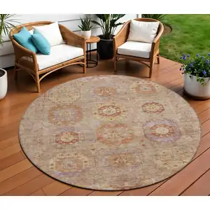 Photo of 8' Khaki Gold And Burgundy Round Medallion Washable Indoor Outdoor Area Rug