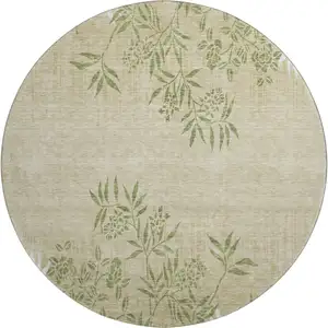 Photo of 8' Khaki Green And Ivory Floral Washable Round Rug With UV Protection