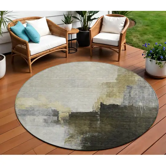 8' Khaki Light Green And Black Round Abstract Washable Indoor Outdoor Area Rug Photo 1