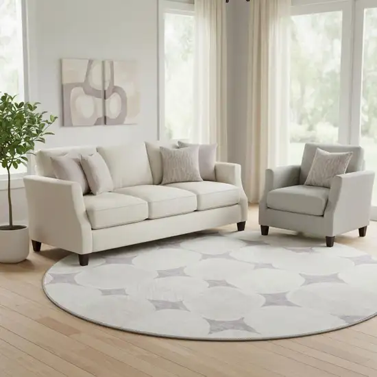 8' Lavender And Ivory Abstract Geometric Washable Round Rug With UV Protection Photo 1