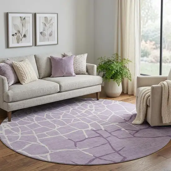 8' Lavender And Ivory Abstract Geometric Washable Round Rug With UV Protection Photo 1