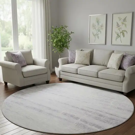 8' Lavender And Ivory Abstract Washable Round Rug With UV Protection Photo 1