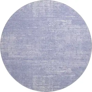 Photo of 8' Lavender And Ivory Abstract Washable Round Rug With UV Protection