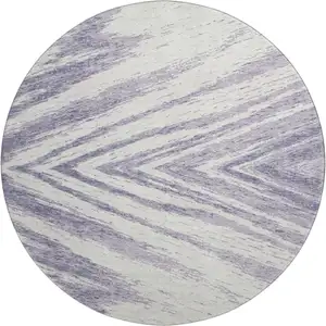 Photo of 8' Lavender And Ivory Abstract Washable Round Rug With UV Protection
