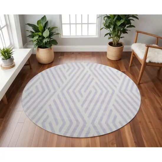 8' Lavender And Ivory Geometric Washable Round Rug With UV Protection Photo 2