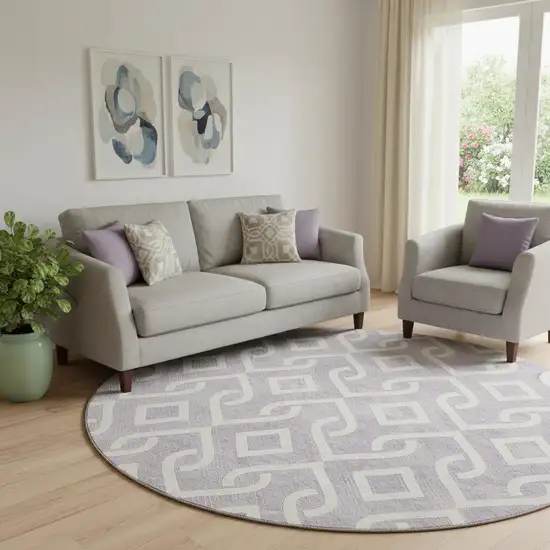 8' Lavender And Ivory Geometric Washable Round Rug With UV Protection Photo 1