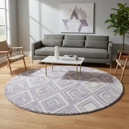 8' Lavender And Ivory Geometric Washable Round Rug With UV Protection Photo 1