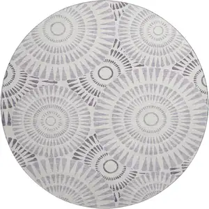 Photo of 8' Lavender And Ivory Geometric Washable Round Rug With UV Protection