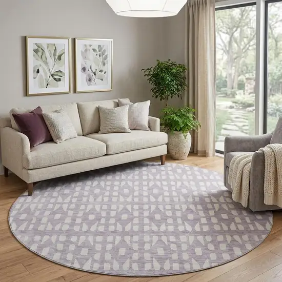 8' Lavender And Ivory Geometric Washable Round Rug With UV Protection Photo 1