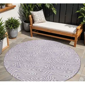 Photo of 8' Lavender And Ivory Round Abstract Washable Indoor Outdoor Area Rug