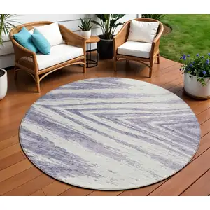 Photo of 8' Lavender And Ivory Round Abstract Washable Indoor Outdoor Area Rug