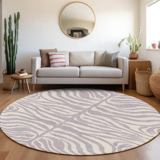 8' Lavender And Ivory Round Animal Print Washable Indoor Outdoor Area Rug Photo 7