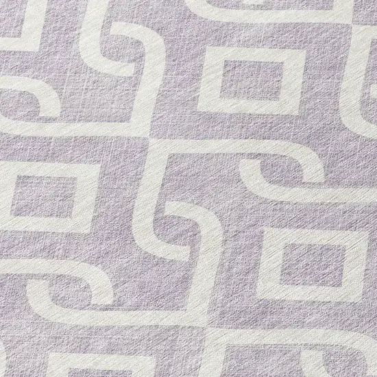 8' Lavender And Ivory Round Geometric Washable Indoor Outdoor Area Rug Photo 7