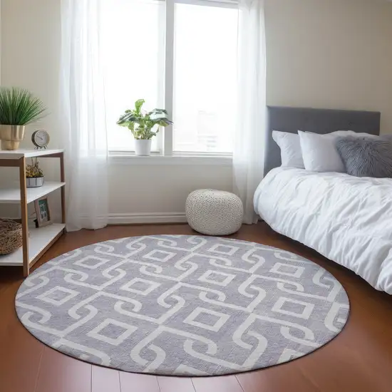 8' Lavender And Ivory Round Geometric Washable Indoor Outdoor Area Rug Photo 6