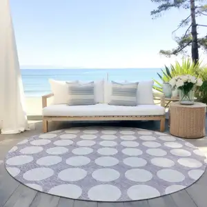Photo of 8' Lavender And Ivory Round Polka Dot Washable Indoor Outdoor Area Rug