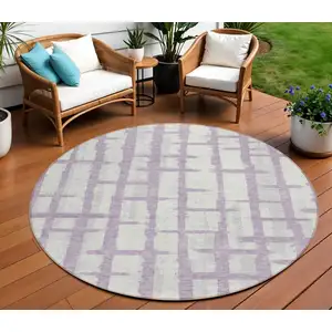Photo of 8' Lavender And Ivory Round Striped Washable Indoor Outdoor Area Rug