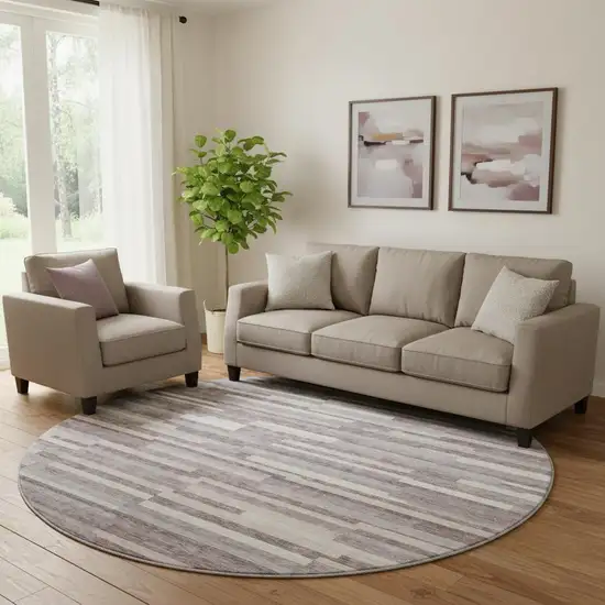 8' Lavender And Ivory Striped Washable Round Rug With UV Protection Photo 1