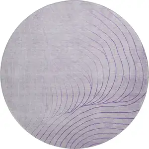 Photo of 8' Lavender And Silver Abstract Washable Round Rug With UV Protection
