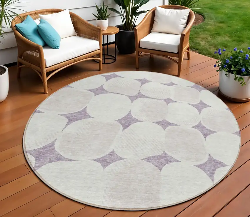 8' Lavender Beige And Ivory Round Abstract Washable Indoor Outdoor Area Rug Photo 1