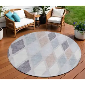 Photo of 8' Lavender Brown And Ivory Round Geometric Washable Indoor Outdoor Area Rug