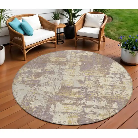 8' Lavender Gold And Beige Round Abstract Washable Indoor Outdoor Area Rug Photo 1