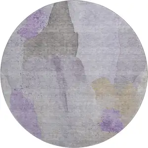 Photo of 8' Lavender Gold And Gray Abstract Washable Round Rug With UV Protection