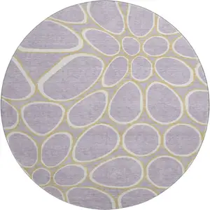 Photo of 8' Lavender Gold And Ivory Geometric Washable Round Rug With UV Protection