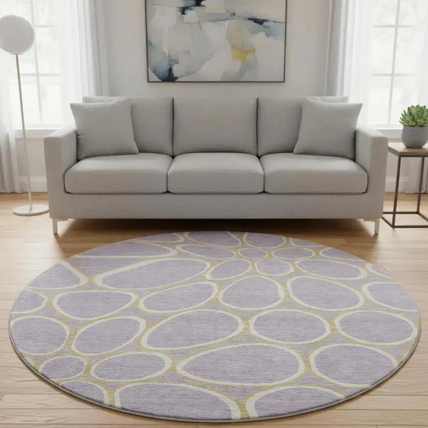 8' Lavender Gold And Ivory Geometric Washable Round Rug With UV Protection Photo 2