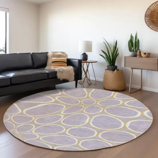 8' Lavender Gold And Ivory Geometric Washable Round Rug With UV Protection Photo 4