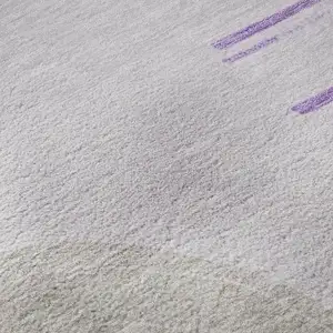 Photo of 8' Lavender Gray And Ivory Geometric Washable Round Rug With UV Protection