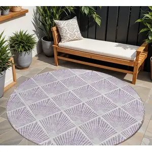 Photo of 8' Lavender Gray And Ivory Round Geometric Washable Indoor Outdoor Area Rug